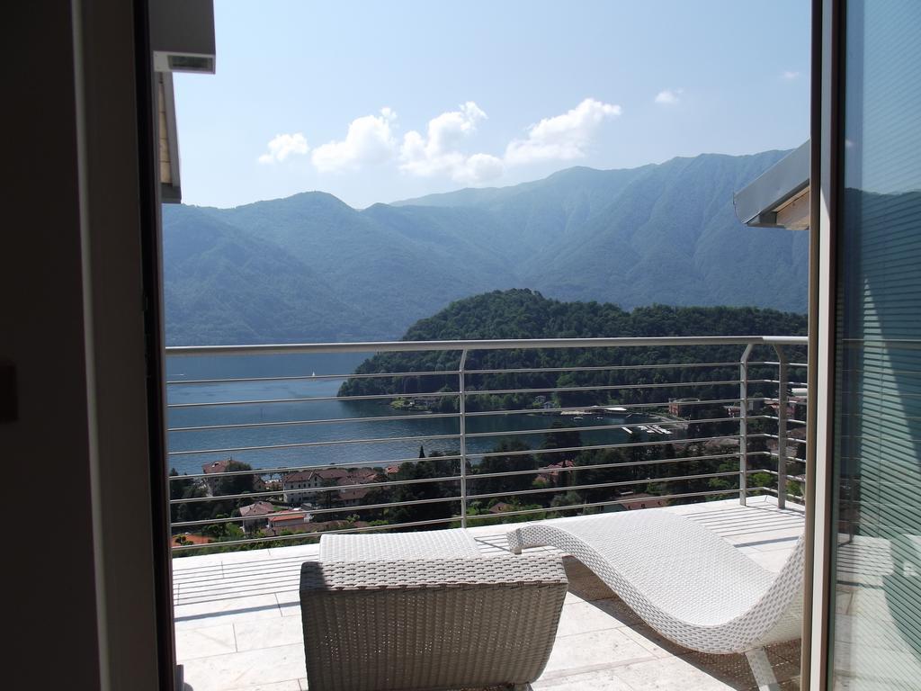 Apartmán Residenza Simona Mezzegra Pokoj fotografie