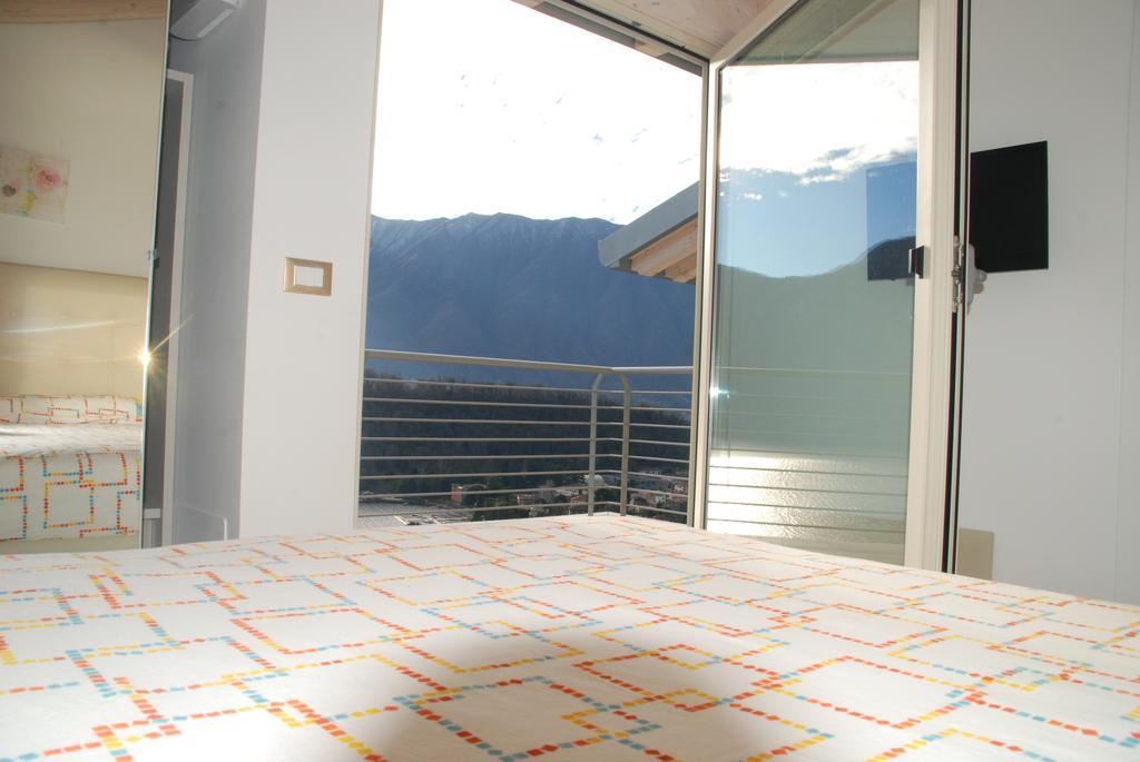 Apartmán Residenza Simona Mezzegra Pokoj fotografie