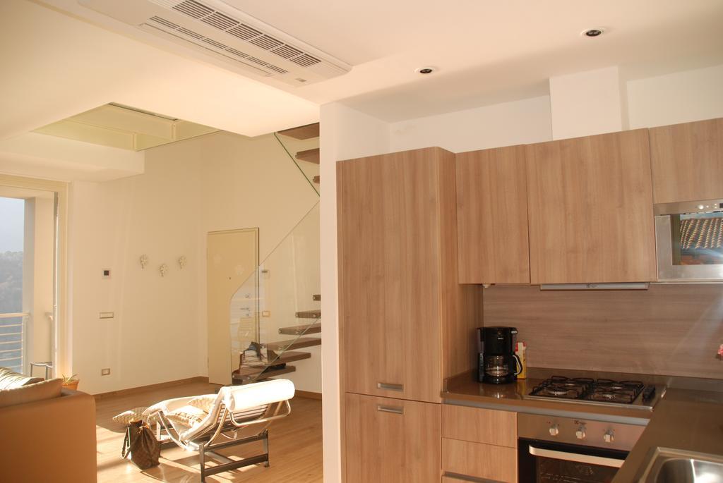 Apartmán Residenza Simona Mezzegra Pokoj fotografie